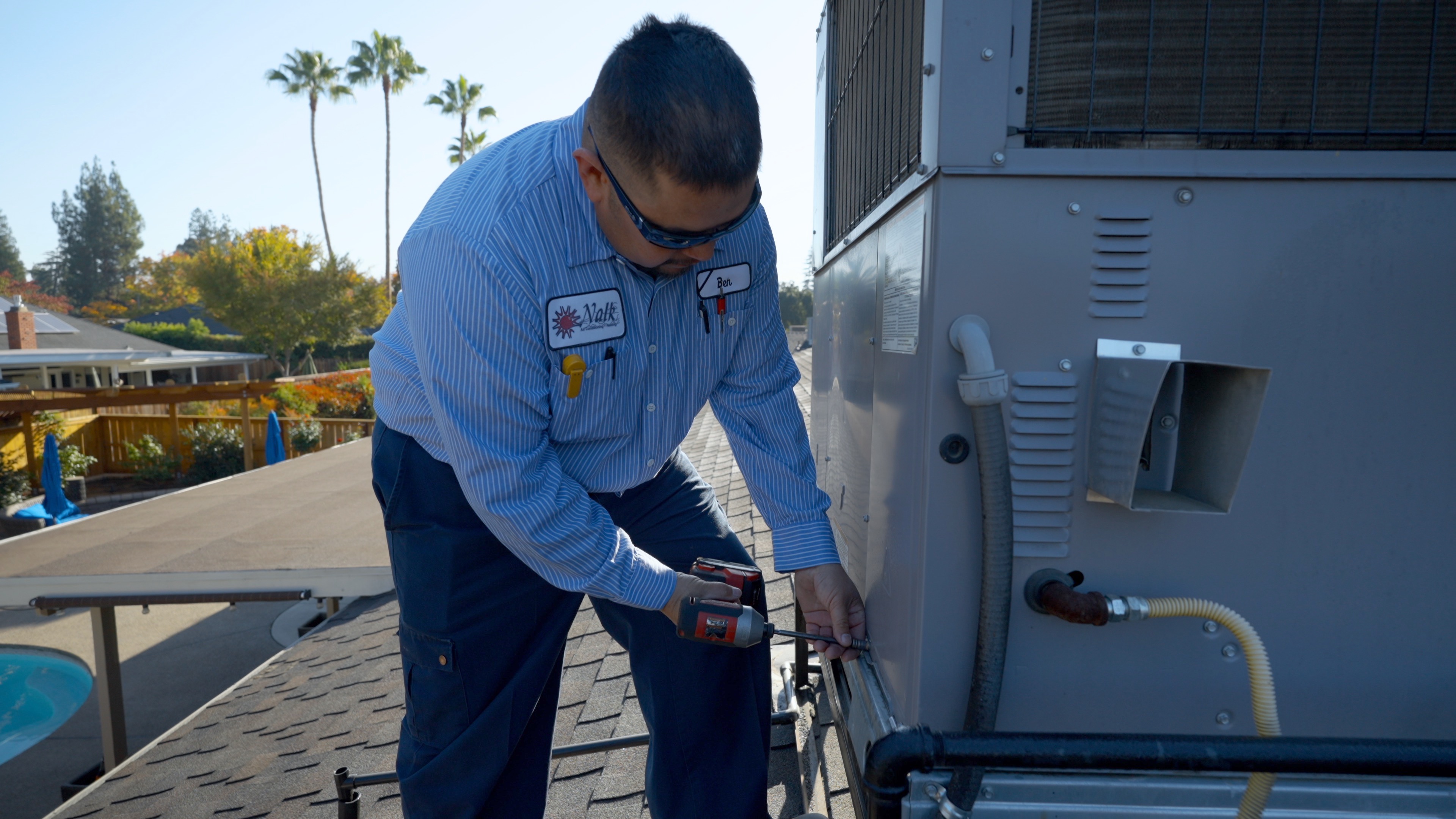 Techinician Ben completing HVAC maintenance in Fresno, CA
