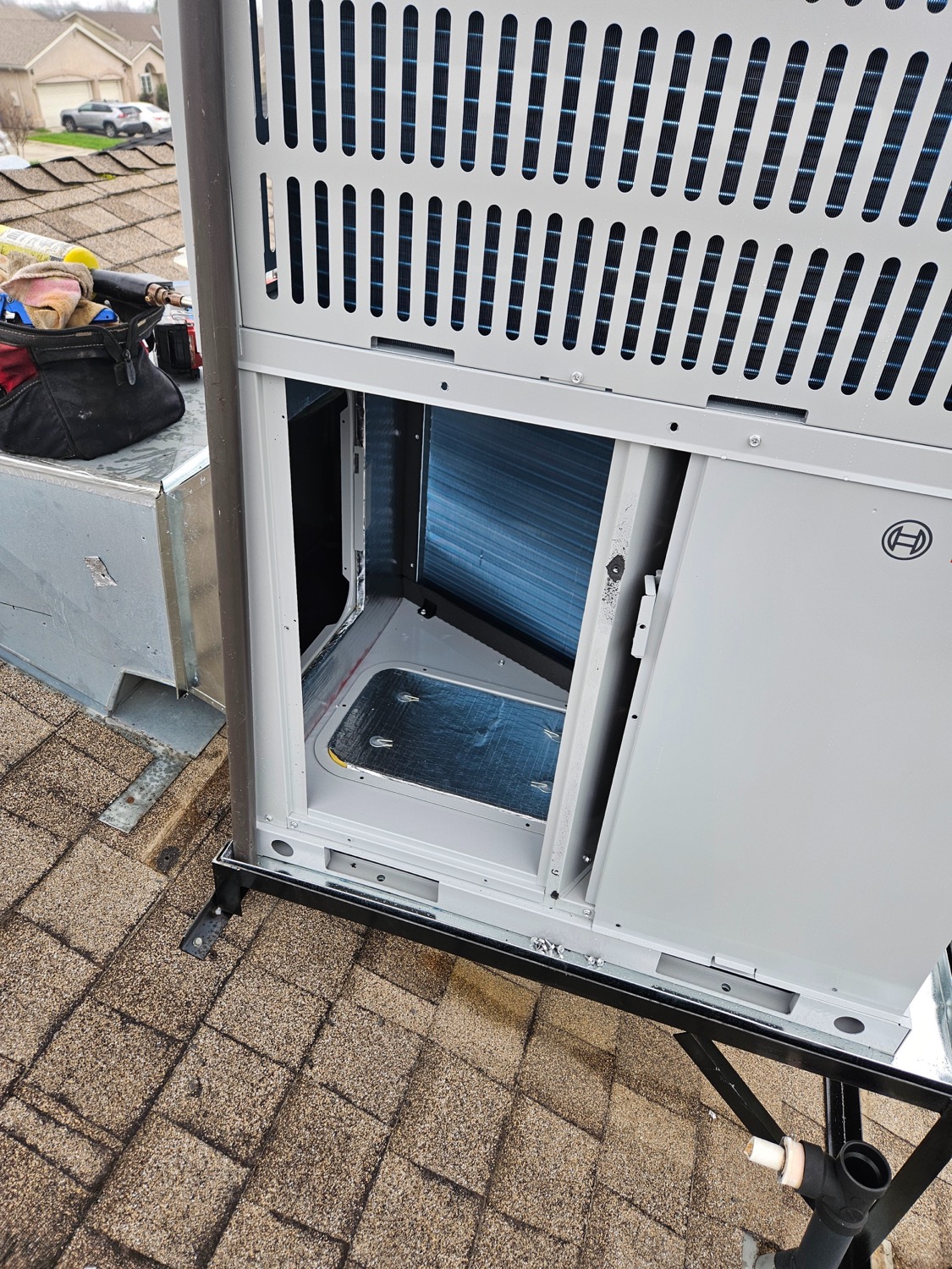 Close-up of a warm-air heating vent in Fresno showing subtle heat waves and dust detail.