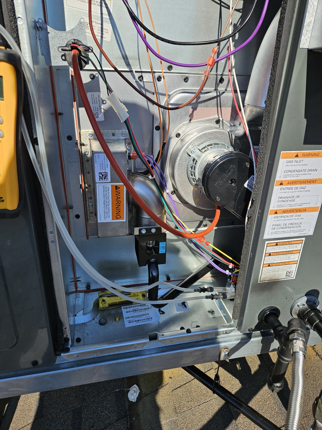 Close-up of a warm-air heating vent in Fresno showing subtle heat waves and dust detail.