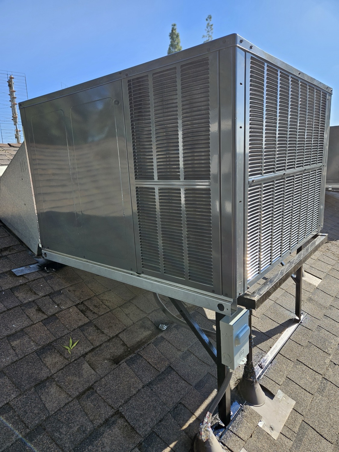 Close-up of furnace venting and metal surfaces showing heat and wear in a Fresno home.